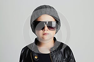 Funny child in hat.fashionable little boy in sunglasses
