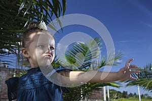 Funny Child looks like a wizard and she has some prediction.