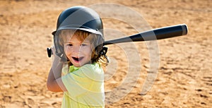 Funny child playing Baseball. Batter in youth league getting a hit. Boy kid hitting a baseball.