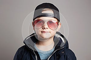 Funny child in sunglasses.Fashionable boy