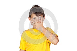 Funny child with yellow t-shirt covering the mouth