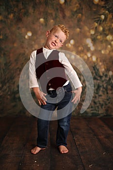 Funny christmas photo of young boy 