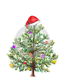 Funny Christmas tree with decorative baubles and red Santa`s hat. Watercolor photo