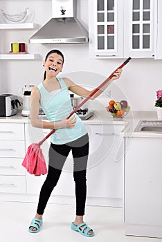 Funny cleaning woman in home