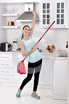 Funny cleaning woman in home