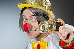 Funny clown against dark background