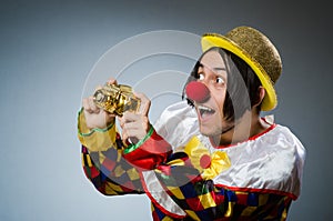 Funny clown against dark background