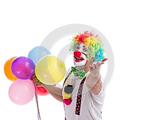 Funny clown with balloons isolated on white background