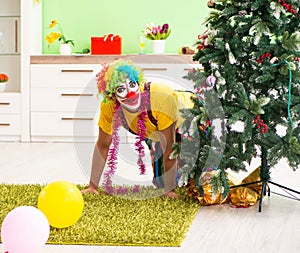 Funny clown in Christmas celebration concept