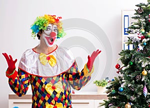 Funny clown in Christmas celebration concept