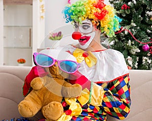 Funny clown in Christmas celebration concept