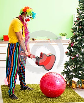 Funny clown in Christmas celebration concept