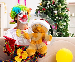 Funny clown in Christmas celebration concept