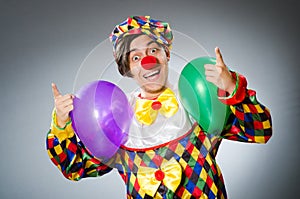 Funny clown in comical concept