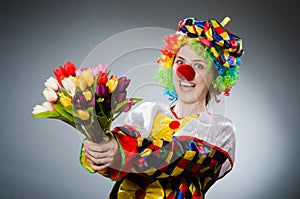 The funny clown in comical concept