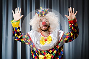 Funny clown in humorous concept