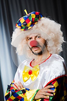 Funny clown in humorous concept
