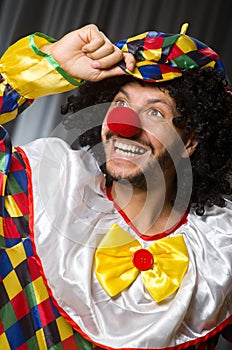 Funny clown in humorous concept