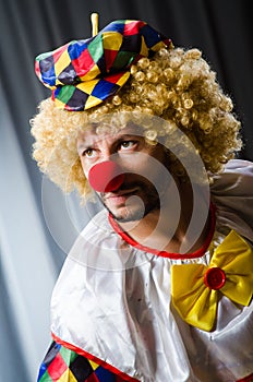 Funny clown in humorous concept