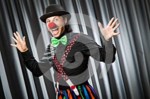 Funny clown in humorous concept