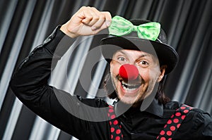 Funny clown in humorous concept