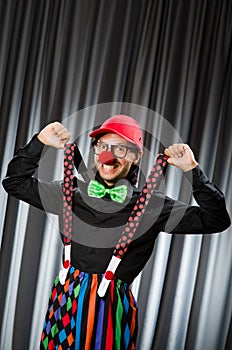 Funny clown in humorous concept