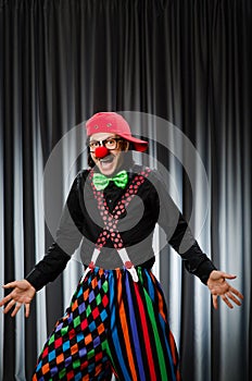 Funny clown in humorous concept