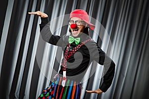 Funny clown in humorous concept