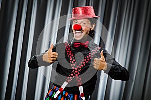 Funny clown in humorous concept