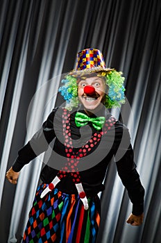 Funny clown in humorous concept