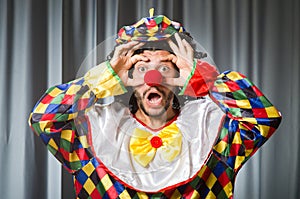 Funny clown in humorous concept