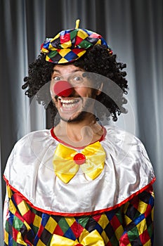 Funny clown in humorous concept