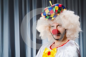 Funny clown in humorous concept