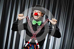 Funny clown in humorous concept