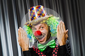 Funny clown in humorous concept