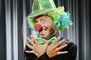 Funny clown in humorous concept