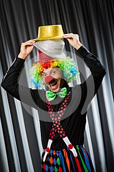 Funny clown in humorous concept