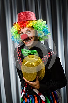 Funny clown in humorous concept