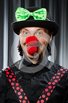 Funny clown in humorous concept