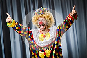 Funny clown in humorous concept