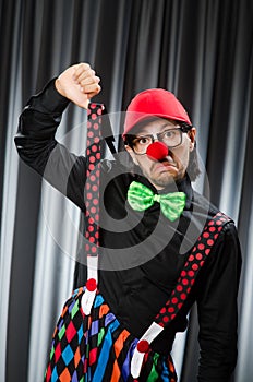 Funny clown in humorous concept