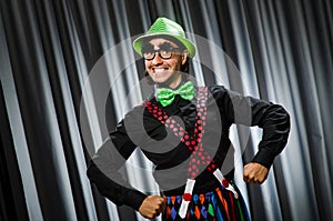 Funny clown in humorous concept