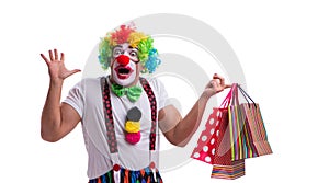 Funny clown with shopping bags isolated on white background