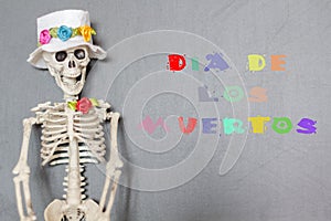 Funny colorful skeleton with the text Dia de los Muertos