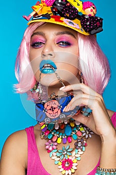 Funny comic girl with bright make-up in the style of pop art. Creative image. Beauty face.