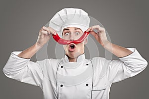 Funny cook with red peppers