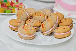 Funny cookies with smiles, sweets on the table