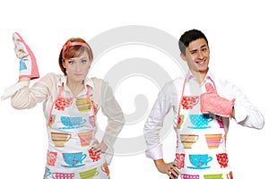 Funny cooking couple-man in apron and chef woman