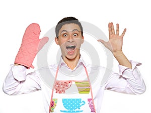 Funny cooking man in kitchen glove screaming