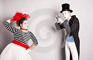 Funny couple of mimes taking a photo, April Fools Day